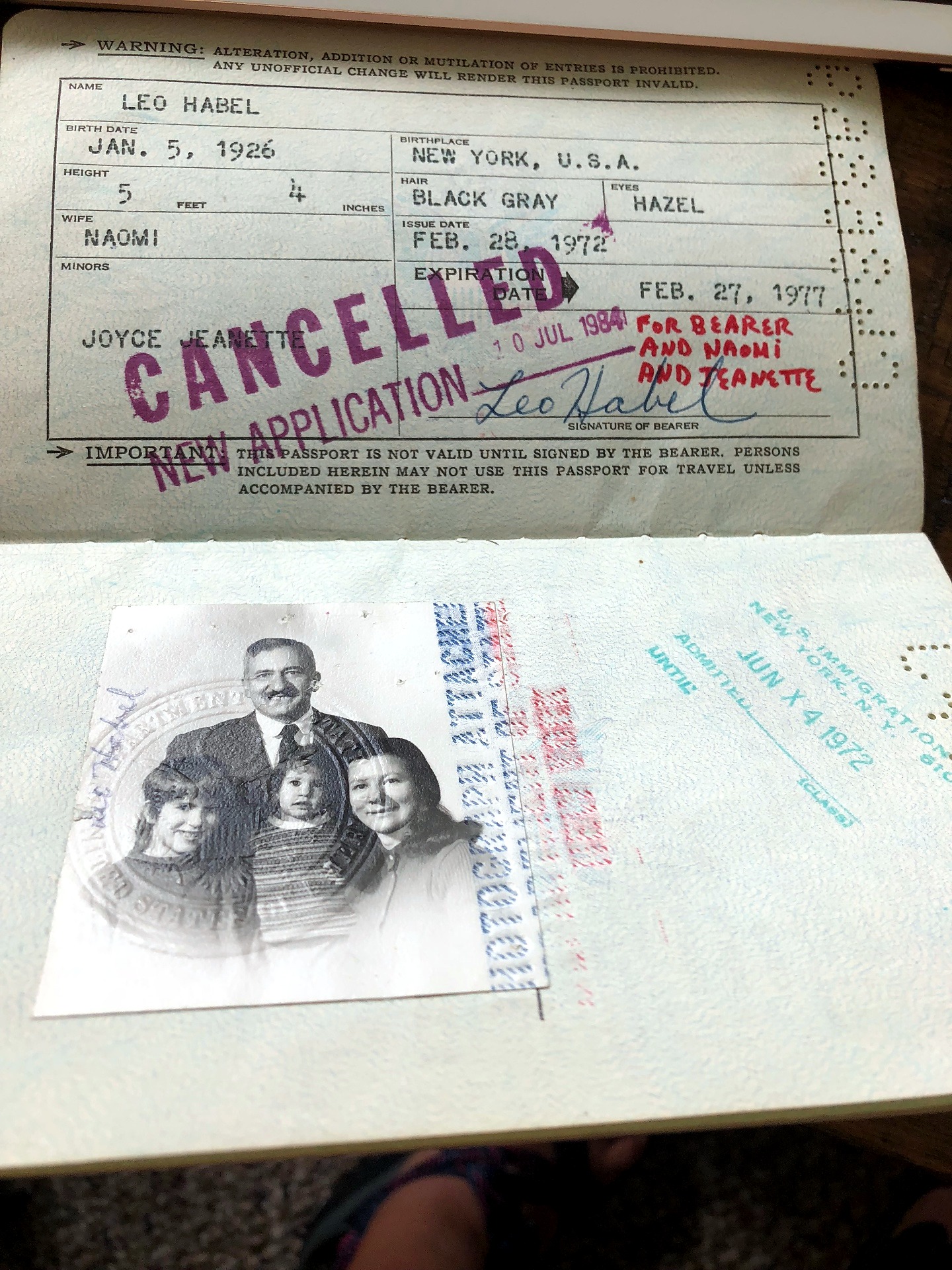 Complete passport page for Leo Habel, including the family photograph, text, and passport stamps